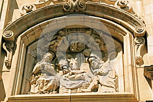 Nativity scupture above old church doorway in Barcelona, Spain