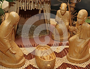 Nativity set in an village with wooden figurines 1