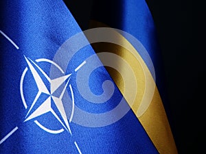 NATO and Ukraine flags as symbol of cooperation photo