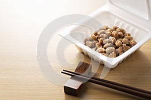 Natto placed on a wooden background