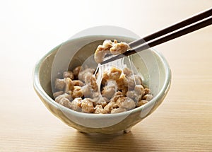 Natto placed on a wooden background