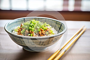 natto with sliced green onions and mustard topping