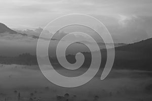 Natural abstract art background in black and white. Misty morning nature view in the mountains. Spirituality backgrounds.