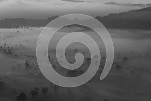 Natural abstract art background in black and white. Misty morning nature view in the mountains. Spirituality backgrounds.