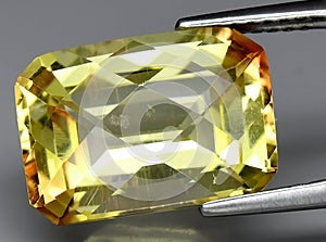 natural andesine sunstone gem on the background