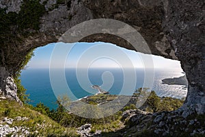 Natural arch called Ojo del Diablo in Cantabria, Spain photo