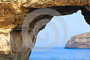 Natural arch in Gozo island. Malta