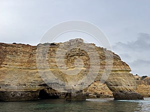 Natural arch at Marinha beach