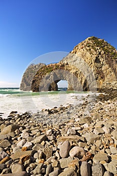 Natural arch on the rocky coastline of Izu Peninsula, Japan