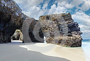 Natural arches on beach