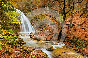 The natural attraction of the Crimean peninsula - a large waterfall Jur-Jur, a beautiful autumn