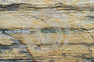 Natural backgound. Texture of slatestone with marble layers