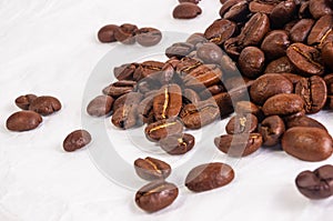 Natural background for Cafe menu or brochure template - macro photo of brown roasted coffee beans, close up