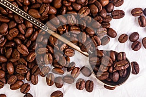 Natural background for Cafe menu or brochure template - macro photo of brown roasted coffee beans, close up