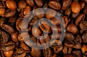 Natural background for Cafe menu or brochure template - macro photo of brown roasted coffee beans, close up
