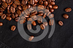 Natural background for Cafe menu or brochure template - macro photo of brown roasted coffee beans, close up