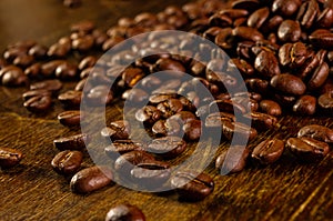 Natural background for Cafe menu or brochure template - macro photo of brown roasted coffee beans, close up