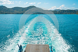 The natural background of indigo water as the ferry sailed in the ocean.