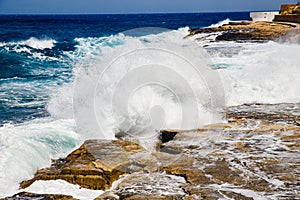 Natural background storm sea blue ocean with foam and waves