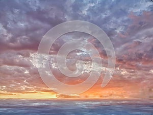 Natural background with sunset and stormy clouds in sea reflection