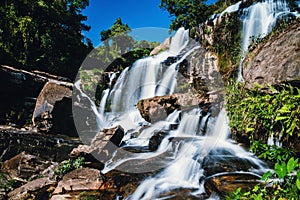 Natural background waterfall. travel nature. Travel relax waterfall. In the summer.  thailand