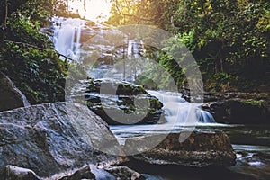 Natural background waterfall. travel nature. Travel relax waterfall. In the summer.  thailand