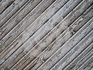 Natural background of wooden dark plank boards diagonal