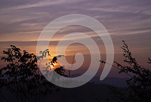 Natural backgrounds of the sunset view with the evening sky on the mountain in the winter.