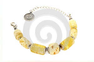 Amber jewelry bracelet, bijouterie. Cut out image on a white background. photo