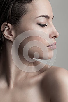 Natural beauty concept young woman  profile  face closeup studio shot
