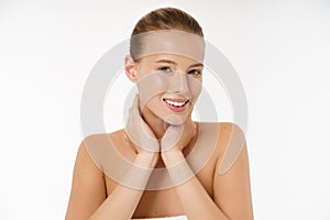 Natural Beauty Portrait. Beautiful Spa Woman smiling isolated over white background. Perfect Fresh Nude Skin