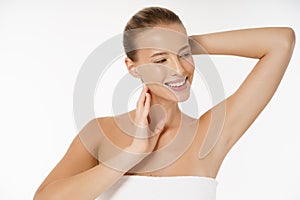 Natural Beauty Portrait. Beautiful Spa Woman smiling isolated over white background. Perfect Fresh Nude Skin