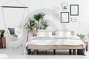 Natural bedroom interior with plants