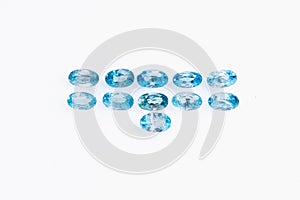 natural blue zircon gem stone on the white background photo