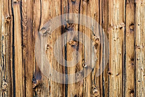 Natural brown barn wood wall. Wall texture background with copyspace. photo
