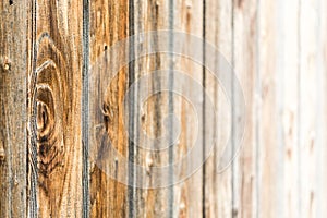 Natural brown barn wood wall. Wooden textured background pattern.