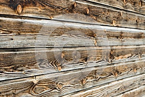 Natural brown barn wood wall. Wooden textured background pattern.