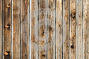 Natural brown barn wood wall. Wooden textured background pattern.