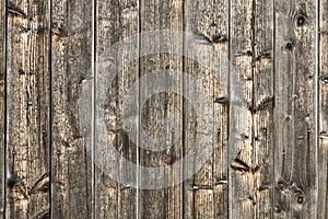 Natural brown barn wood wall. Wooden textured background pattern.