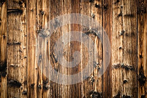 Natural brown barn wood wall. Wooden textured background pattern.