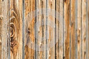Natural brown barn wood wall. Wooden textured background pattern.