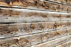 Natural brown barn wood wall. Wooden textured background pattern.