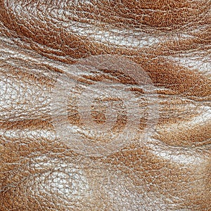 Natural brown leather surface. Worn out shoe.