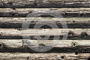 Natural brown log cabin wood wall. Wall texture background pattern.