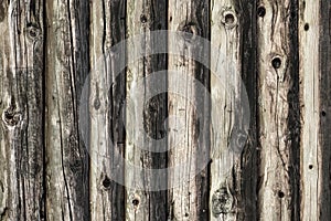 Natural brown log cabin wood wall. Wall texture background pattern.