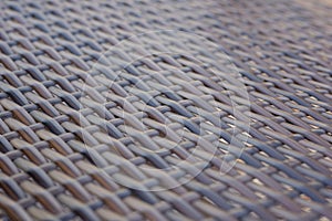 Natural brown texture of wicker rods, Wicker rattan texture, closeup.