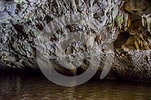 Natural cave with texture formations of stalactites in Vietnam