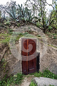 Natural caves in the slopes of the Barranco de Guayadeque in the Aguimes valley on the Canary Island, Spain