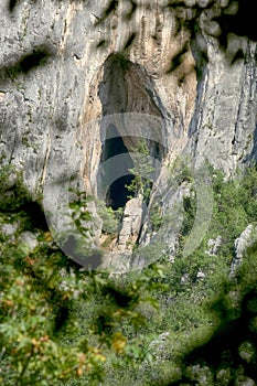 Natural Cavity On Cliff Of Vrachanski Mountains, Bulgaria photo