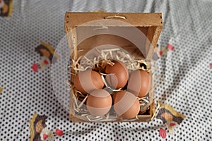natural chicken egg on wooden table, rustic free range chicken natural farm food yolk and white of bird animal